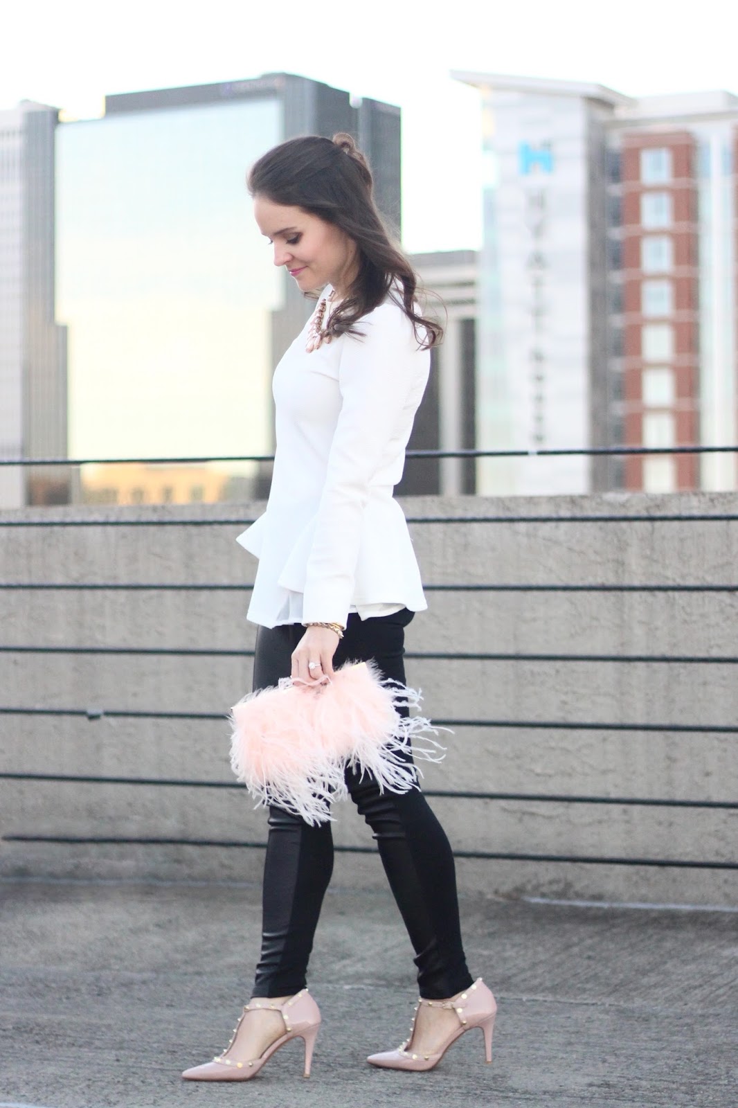 pink feather clutch