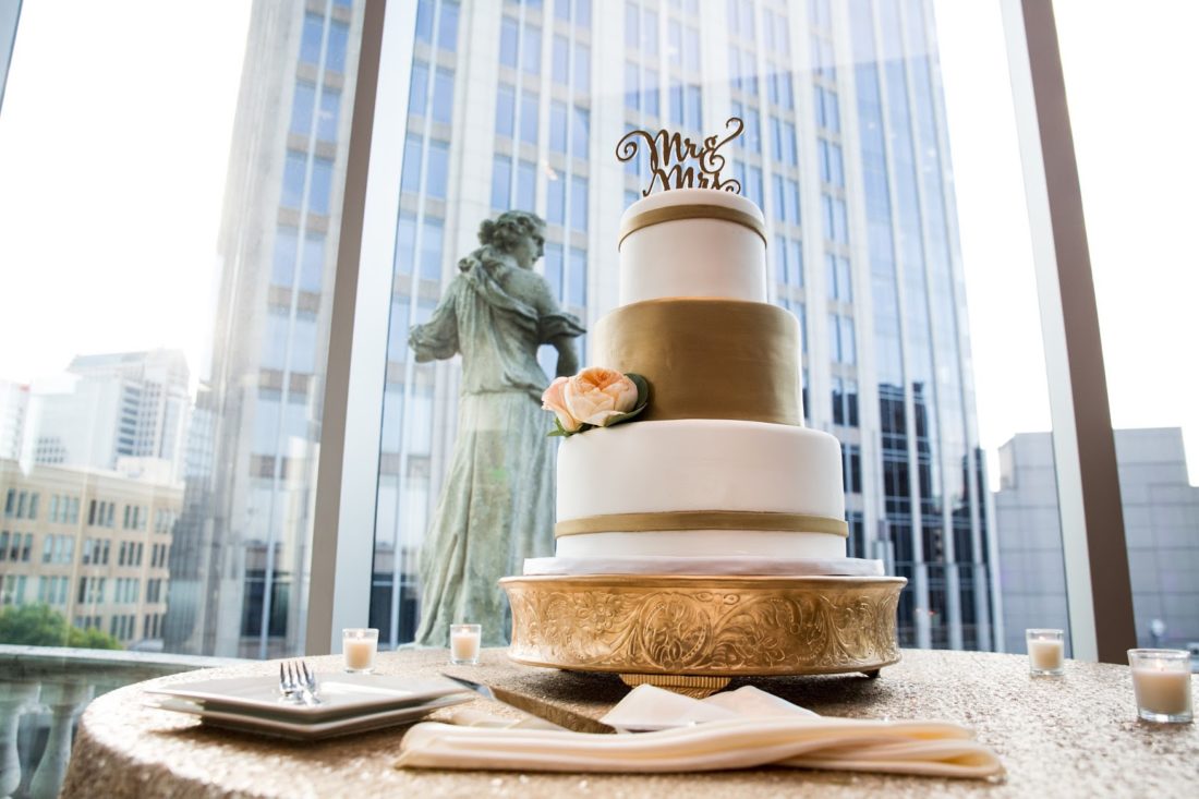 gold and white wedding cake wow factor cakes